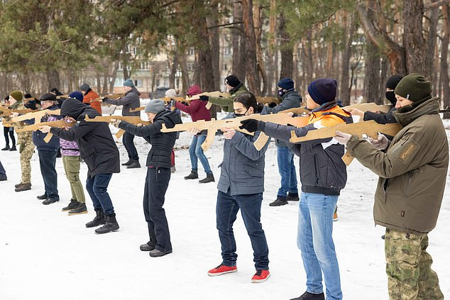 Ukrainian children as young as four are trained by military on how to shoot and defend their borders from Russian invasion (photos) 	