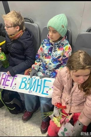 Primary schoolchildren arrested in Russia for waving signs of 