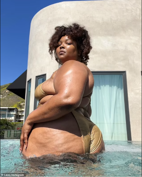 Singer, Lizzo showcases her curves in a shimmering gold string bikini 
