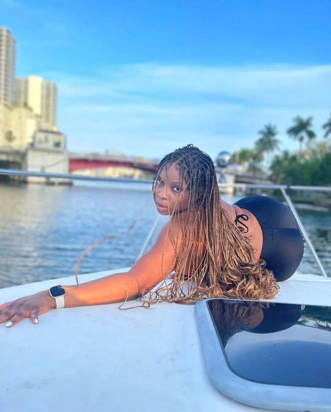 Yemi Alade puts her hot body on display as she  enjoys a yacht ride with friends in Florida (photos)